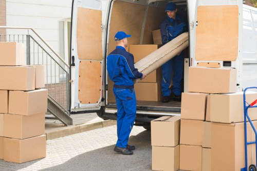 Team member reviewing a customer complaint form at a storage facility