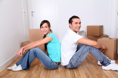 Carefully packed sofas and tables in storage