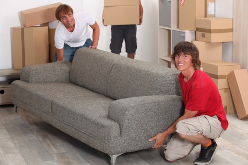 Office equipment and storage items being transported by small removals in Haroldhill